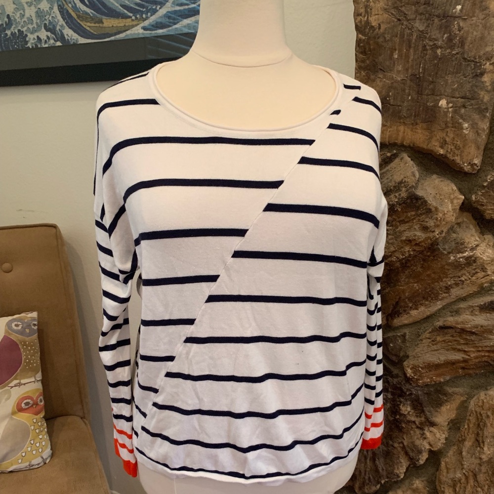 Lane Bryant black & white sweater with red accent.